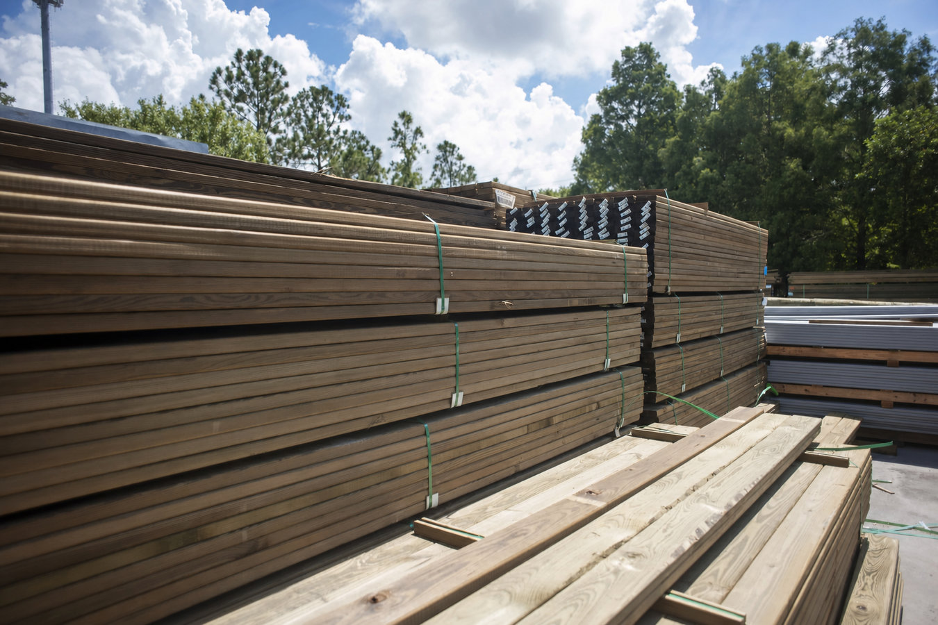 Pressure-treated wood deck construction